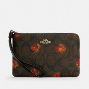 NWT Coach Wristlet In Signature Canvas with Floral Print